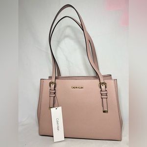 Beautiful Calvin Klein handbag in color Blush Pink
New with tags
Genuine leather